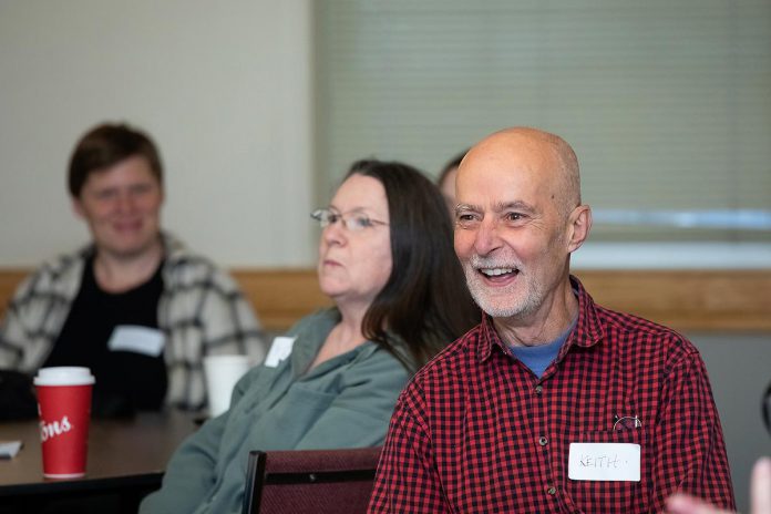 Keith Dalton, board member of Peterborough Action for Tiny Homes (PATH), during an event to discuss One City Peterborough's housing strategy at Knights of Columbus Hall on May 12, 2026. PATH has been working to develop additional residential units (ARUs) at residential properties owned by One City. (Photo: Jordan Lyall / kawarthaNOW)