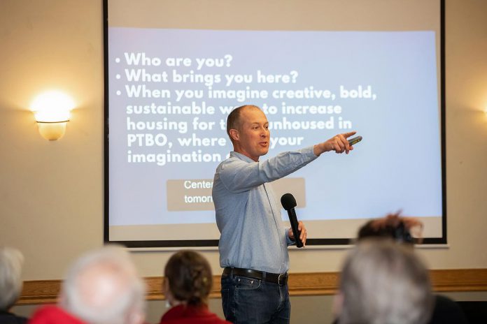 Michael VanDerHerberg, director of property development at One City Peterborough, speaks to attendees during an event to discuss the non-profit organization's housing strategy at Knights of Columbus Hall on May 12, 2026. (Photo: Jordan Lyall / kawarthaNOW)