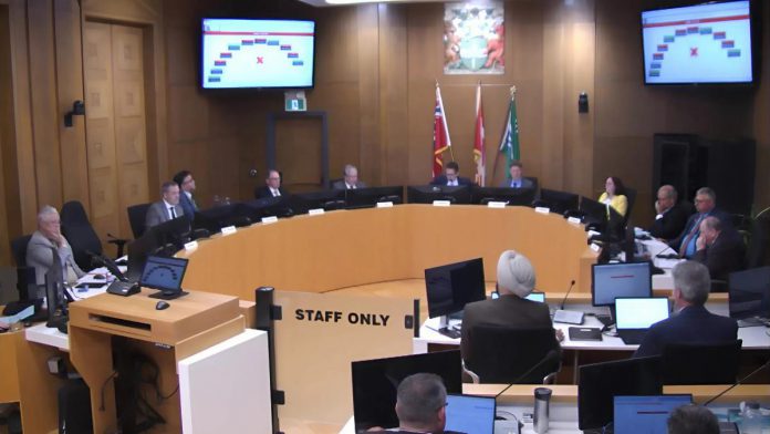 At Peterborough city council's general committee meeting on May 4, 2026, a motion to defer Mayor Leal's motion to commit the city to financing $57 million of the cost of a proposed $170-million sport and event centre in downtown Peterborough failed 6-4, with councillor Alex Bierk absent from the meeting. Councillors later approved the mayor's motion. (kawarthaNOW screenshot of City of Peterborough video)