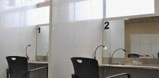 Two of the three consumption booths at the Consumption and Treatment Services (CTS) site located at 220 Simcoe Street in downtown Peterborough. With medical assistance available on site, substance users at the CTS are monitored in case they suffer an adverse reaction when using. (Photo: Bruce Head / kawarthaNOW)