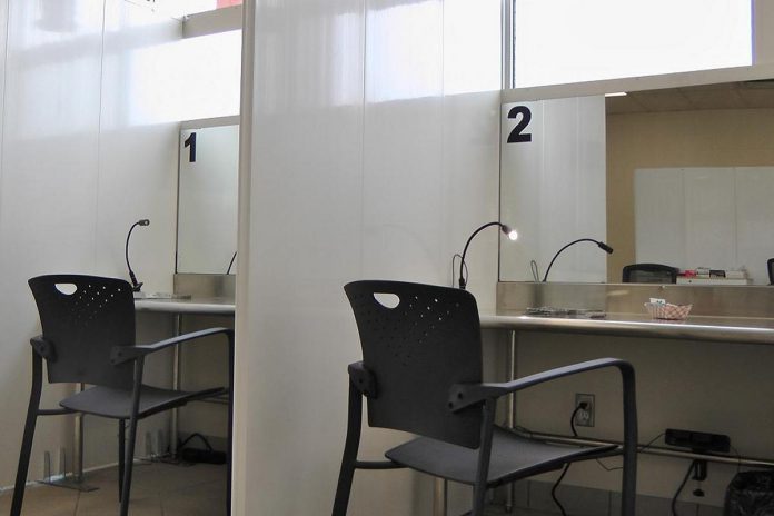 Two of the three consumption booths at the Consumption and Treatment Services (CTS) site located at 220 Simcoe Street in downtown Peterborough. With medical assistance available on site, substance users at the CTS are monitored in case they suffer an adverse reaction when using. (Photo: Bruce Head / kawarthaNOW) Two of the three consumption booths at the Consumption and Treatment Services (CTS) site located at 220 Simcoe Street in downtown Peterborough. With medical assistance available on site, substance users at the CTS are monitored in case they suffer an adverse reaction when using. (Photo: Bruce Head / kawarthaNOW)