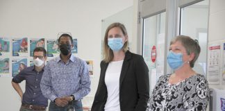 ‘It’s not a hypothetical’: Medical officer of health says Peterborough CTS closure will drive more overdoses to ER Lakelands Public Health medical officer of health Dr. Thomas Piggott (left) with PARN executive director Dane Record (second from left) during a May 2022 media tour prior to the opening of Peterborough's Consumption and Treatment Site (CTS) on Simcoe Street in downtown Peterborough. Also pictured are CTS program manager Kerri Kightley and Fourcast executive director Donna Rogers. (Photo: Jeannine Taylor / kawarthaNOW)