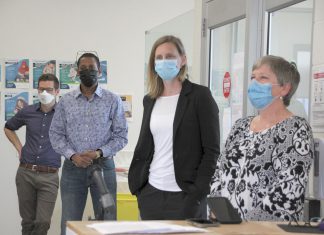 ‘It’s not a hypothetical’: Medical officer of health says Peterborough CTS closure will drive more overdoses to ER Lakelands Public Health medical officer of health Dr. Thomas Piggott (left) with PARN executive director Dane Record (second from left) during a May 2022 media tour prior to the opening of Peterborough's Consumption and Treatment Site (CTS) on Simcoe Street in downtown Peterborough. Also pictured are CTS program manager Kerri Kightley and Fourcast executive director Donna Rogers. (Photo: Jeannine Taylor / kawarthaNOW)