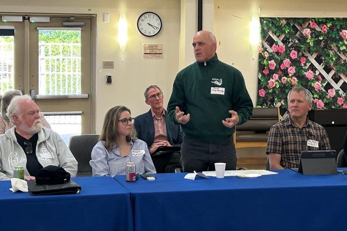 Camp Kawartha executive director Jacob Rodenburg speaks to representatives of 27 other local charitable organizations that received grants from the Peterborough Foundation between December 2024 and December 2025, totalling over $250,000, during a recipient reception at St. Joseph's at Fleming on May 21, 2026. (Photo courtesy of Mike Melnik / Peterborough Foundation)