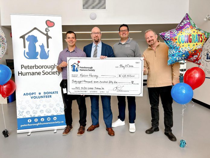 Marcus Harvey (second from left) won $68,755 in the fifth editio of the Peterborough Humane Society's 50/50 lottery, which ran from April 9 to May 15, 2026. (Photo courtesy of Peterborough Humane Society)