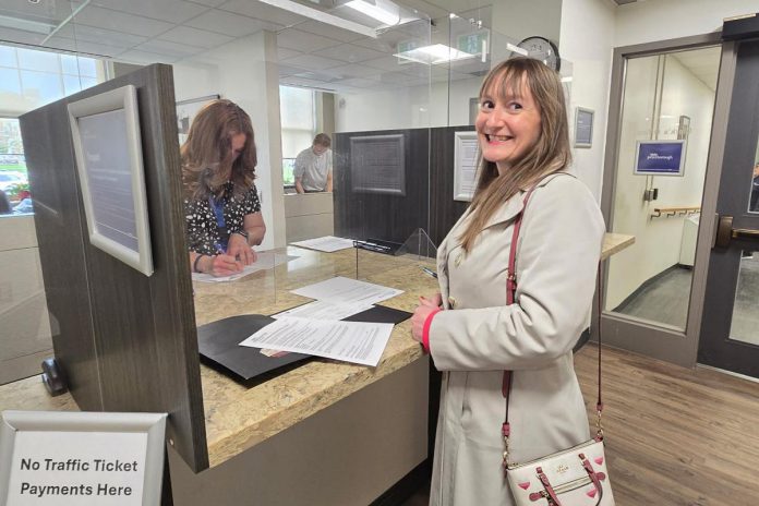 Rebecca Schillemat filing her nomination papers as a mayoral candidate in the 2026 municipal election at the clerk's office at Peterborough City Hall on Friday, May 1. (Photo: Jeannine Taylor / kawarthaNOW)