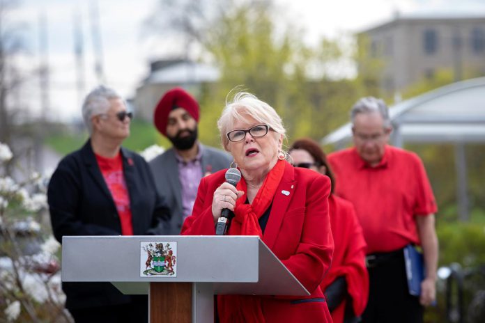 Peterborough County warden Bonnie Clark speaks during an event to commemorate Red Dress Day at Peterborough City Hall on May 5, 2026. (Photo: Jordan Lyall / kawarthaNOW)