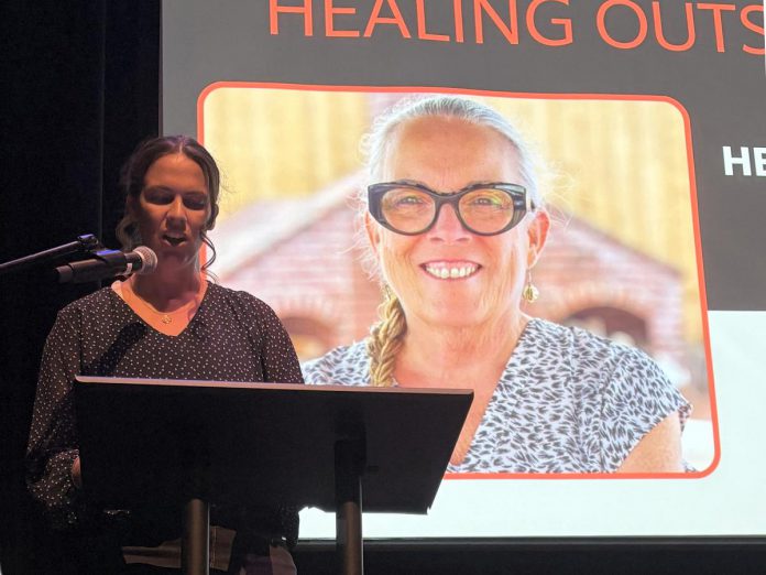 Liz Shaughnessy-Rowe, manager of programs at RedPath, introducing her mother Dr. Shaughnessy Shaughnessy, creator of the RedPath Approach, founder and director of care for the RedPath Wellness Centre, and president of Whitepath Consulting. (Photo courtesy of RedPath Wellness Centre)