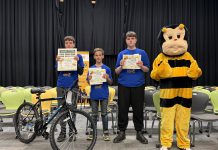 The top three spellers of the intermediate division (grades 7 and 8) at the Rotary Club of Peterborough's 12th annual spelling bee on May 2, 2026 at Whetung Theatre at Fleming College: Henry Sharpe from Adam Scott Intermediate Public School, Hudson Inglis of Kawartha Classical Christian School, and Tyler Phillips of St. Teresa Catholic Elementary School. Along with the top three spellers from the junior division (grades 4 to 6), the students won prizes including bikes from Canadian Tire. (Photo courtesy of Rotary Club of Peterborough)