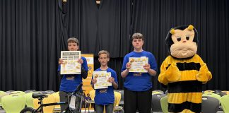 The top three spellers of the intermediate division (grades 7 and 8) at the Rotary Club of Peterborough's 12th annual spelling bee on May 2, 2026 at Whetung Theatre at Fleming College: Henry Sharpe from Adam Scott Intermediate Public School, Hudson Inglis of Kawartha Classical Christian School, and Tyler Phillips of St. Teresa Catholic Elementary School. Along with the top three spellers from the junior division (grades 4 to 6), the students won prizes including bikes from Canadian Tire. (Photo courtesy of Rotary Club of Peterborough)