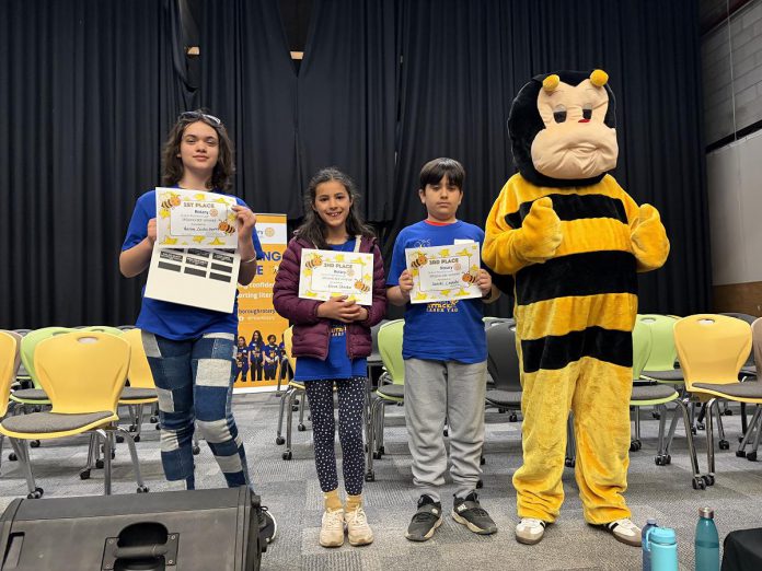 The top spellers of the junior division (grades 4 to 6) at the Rotary Club of Peterborough's 12th annual spelling bee on May 2, 2026 at Whetung Theatre at Fleming College: Verna Conlin Hanley from St. Anne Catholic Elementary School, Elise Stenko of Westmount Public School, Daniel Casado of Monsignor O'Donoghue Catholic Elementary School. (Photo courtesy of Rotary Club of Peterborough)