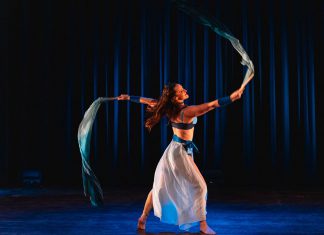 Amy MacKenzie-Strizic will be one of several local performers presenting new and in-progress works during the "small dance in a small space" festival presented by The Theatre on King in downtown Peterborough from May 14 to 16, 2026. She will be joined by Mackenzie Phillips to present a duet silk fans act that combines dance and circus arts. This year's festival will also see work from Naomi Duvall, Kevin Gallagher, Mintu Marie James, and Liz Ingram. (Photo: Bryan Reid)