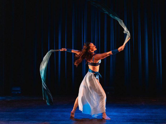 Amy MacKenzie-Strizic will be one of several local performers presenting new and in-progress works during the "small dance in a small space" festival presented by The Theatre on King in downtown Peterborough from May 14 to 16, 2026. She will be joined by Mackenzie Phillips to present a duet silk fans act that combines dance and circus arts. This year's festival will also see work from Naomi Duvall, Kevin Gallagher, Mintu Marie James, and Liz Ingram. (Photo: Bryan Reid)