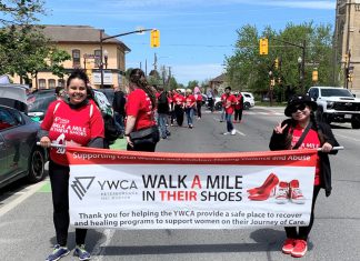 The annual Walk a Mile in Their Shoes event in downtown Peterborough on May 22, 2026 raised $38,341.71 for YWCA Peterborough Haliburton in support of programs and services for women, children, and gender-diverse individuals escaping the effects of gender-based violence. (Photo: YWCA Peterborough Haliburton)