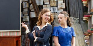 Rainbow Kester and Alex Pearce as teachers Evie Bothwell and Melita Linton in a scene from Leanna Brodie's play "Schoolhouse" during a media day event on June 17, 2026 hosted by 4th Line Theatre at Winslow Farm near Millbrook. The play, which runs from June 30 to July 25, tells the story of the newly graduated Miss Linton as she teaches in a one-room school near the fictional village of Baker's Creek in 1938 and deals with a withdrawn boy recently released from reform school. (Photo: Jordan Lyall / kawarthaNOW)