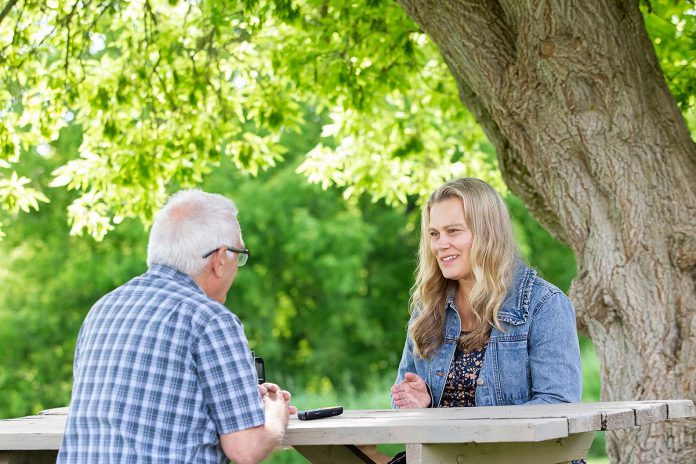kawarthaNOW's Paul Rellinger interviews "Schoolhouse" director and choreographer Monica Dottor during a media day event on June 17, 2026 hosted by 4th Line Theatre at Winslow Farm near Millbrook. (Photo: Jordan Lyall / kawarthaNOW)