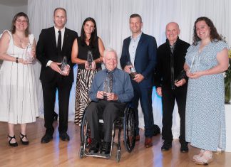 Five-time Paralympian Alec Denys honoured with national award in advance of National AccessAbility Week Pictured with other award winners, five-time Paralympian Alec Denys (middle) received the Trailblazer Award from the Abilities Centre in Whitby on May 29, 2026. The award is presented to a Canadian with a disability who has overcome systematic barriers to achieve a significant accomplishment that redefined how society perceives ability. (Photo: Abilities Centre)