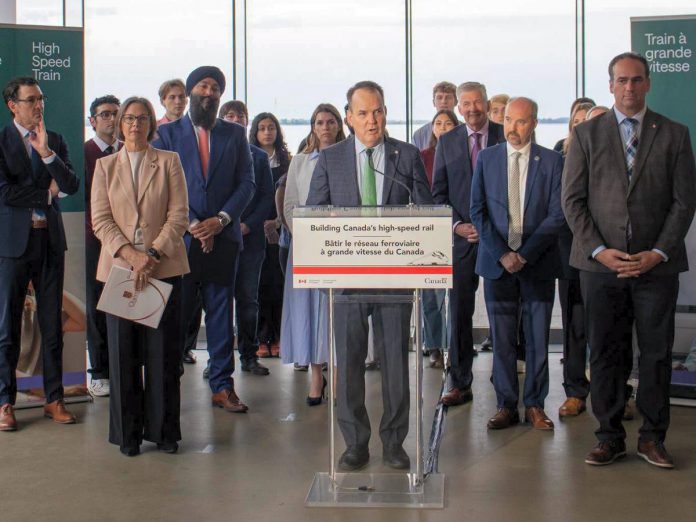 Federal Minister of Transport Steven MacKinnon at Queen's University in Kingston on June 22, 2026 announcing the release of Alto's public and Indigenous consultation report, where he also announced that he has directed the Crown corporation to develop a southern corridor option that includes a station in Kingston for the Peterborough-Ottawa section of the proposed 1,000-kilometre high-speed rail (HSR) network between Toronto and Québec City. (Photo: Office of Steven MacKinnon / Facebook) Federal Minister of Transport Steven MacKinnon at Queen's University in Kingston on June 22, 2026 announcing the release of Alto's public and Indigenous consultation report, where he also announced that he has directed the Crown corporation to develop a southern corridor option that includes a station in Kingston for the Peterborough-Ottawa section of the proposed 1,000-kilometre high-speed rail (HSR) network between Toronto and Québec City. (Photo: Office of Steven MacKinnon / Facebook)