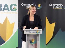 Community Futures Peterborough executive director Devon Girard at the podium during the not-for-profit economic development organization's annual general meeting on June 23, 2026 at the Venture North building in downtown Peterborough. (Photo courtesy of Community Futures Peterborough)