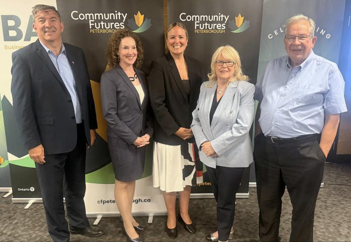 Peterborough-Kawartha MPP Dave Smith, incoming Community Futures Peterborough board chair Jenny Olauson, Community Futures Peterborough executive director Devon Girard, Peterborough County warden Bonnie Clark, and City of Peterborough mayor Jeff Leal at the not-for-profit economic development organization's annual general meeting on June 23, 2026 at the Venture North building in downtown Peterborough. (Photo courtesy of Community Futures Peterborough)