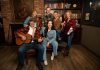 The cast of the Capitol Theatre's production of the Broadway smash-hit musical "Come From Away" at the historic venue in Port Hope from July 10 to August 9, 2026 includes (front) Beau Dixon and Julie Lumsden and (back) Melissa Payne, Kyle Blair, Kyle Golemba, and Donna Garner. Not pictured: Monique Lund, Tat Austrie, Annika Tupper, Charlie Clark, Brendan Wall, and Scott Carmichael. (Photo: Sam Moffatt)