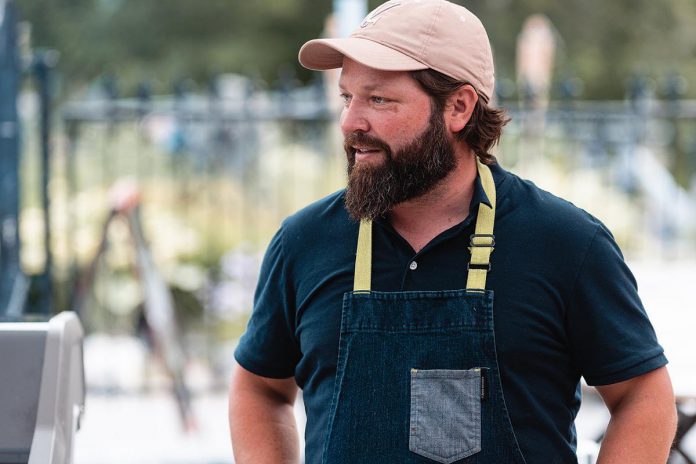 After growing up near Chemong Lodge, where he has many cherished memories of celebrating birthdays and family events, Adam Brown purchased the historic Bridgenorth restaurant and events venue along with his wife Sara in 2021. He is interested in becoming a member of the Kawartha Local Food Wholesale program, supported in part by Peterborough County, that aims to increase the capacity for local food distribution by connecting local food producers with wholesale buyers like Chemong Lodge. (Photo: Bryan Reid, courtesy of Chemong Lodge)