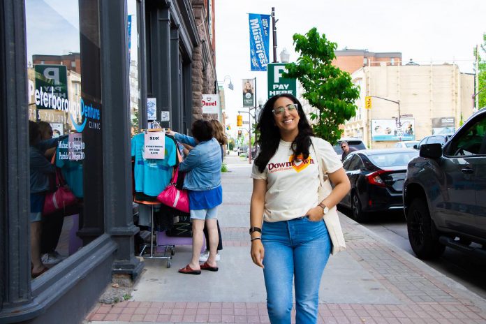 Peterborough Downtown Business Improvement Area (DBIA) executive director Nour Mazloum walks downtown wearing a T-shirt with the original DBIA logo from when the organization was founded in 1981. The merchandise is being rolled out as part of a celebration for the organization's 45-year anniversary, just as Mazloum reflects on her two years at its helm. (Photo courtesy of Peterborough DBIA) Peterborough Downtown Business Improvement Area (DBIA) executive director Nour Mazloum walks downtown wearing a T-shirt with the original DBIA logo from when the organization was founded in 1981. The merchandise is being rolled out as part of a celebration for the organization's 45-year anniversary, just as Mazloum reflects on her two years at its helm. (Photo courtesy of Peterborough DBIA)