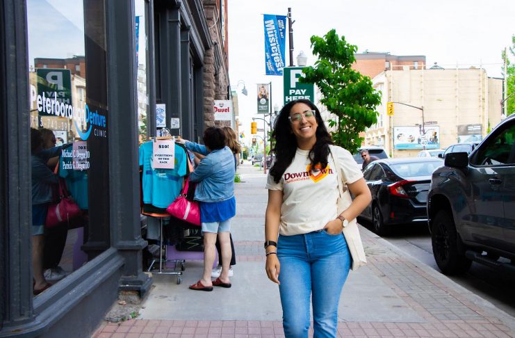 Peterborough Downtown Business Improvement Area revives original logo as it celebrates its 45th year Peterborough Downtown Business Improvement Area (DBIA) executive director Nour Mazloum walks downtown wearing a T-shirt with the original DBIA logo from when the organization was founded in 1981. The merchandise is being rolled out as part of a celebration for the organization's 45-year anniversary, just as Mazloum reflects on her two years at its helm. (Photo courtesy of Peterborough DBIA)