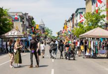 Pedestrian-friendly monthly sidewalk sales returning to downtown Peterborough on Saturdays this summer During the Second Saturday Sidewalk Sales organized by the Peterborough Downtown Business Improvement Area (DBIA) on June 13, July 11, August 8, and September 12, 2026, a portion of George Street will be closed to motor vehicles from Hunter Street in the north to Simcoe Street in the south to create expanded pedestrian space for shopping, dining, live entertainment, family-friendly activities, and more. (Photo courtesy of Peterborough DBIA)