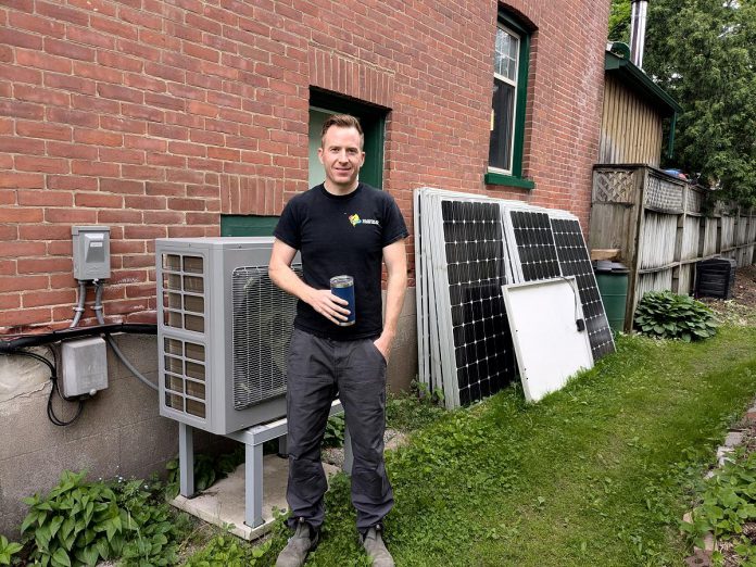 Shane Switzer of Kawartha Eco Climate Control installed this heat pump in an older home in the Avenues neighbourhood in Peterborough in 2024. Although the primary motivation for installation was extremely efficient heating, it has the added benefit of providing cooling as well, something the home did not previously have. (Photo: Clara Blakelock / GreenUP)