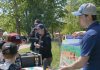 Ontario Power Generation facilitated a guest activity centre at the 24th annual Peterborough Children's Water Festival, which saw around 1,400 children in grades two to five participate in immersive educational experiences at Riverview Park and Zoo on May 27 and 28, 2026. Students are pictured here learning how water can generate power. (Photo: Yvonne Hollandy / GreenUP)