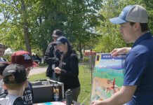 Ontario Power Generation facilitated a guest activity centre at the 24th annual Peterborough Children's Water Festival, which saw around 1,400 children in grades two to five participate in immersive educational experiences at Riverview Park and Zoo on May 27 and 28, 2026. Students are pictured here learning how water can generate power. (Photo: Yvonne Hollandy / GreenUP)