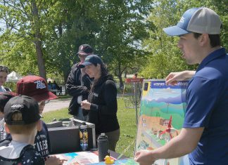 Ontario Power Generation facilitated a guest activity centre at the 24th annual Peterborough Children's Water Festival, which saw around 1,400 children in grades two to five participate in immersive educational experiences at Riverview Park and Zoo on May 27 and 28, 2026. Students are pictured here learning how water can generate power. (Photo: Yvonne Hollandy / GreenUP)