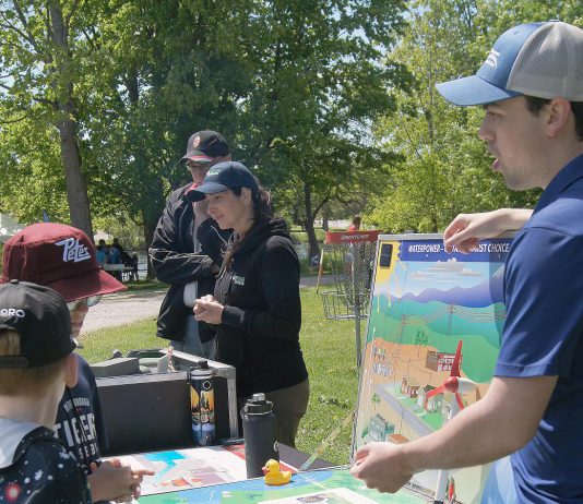 Ontario Power Generation facilitated a guest activity centre at the 24th annual Peterborough Children's Water Festival, which saw around 1,400 children in grades two to five participate in immersive educational experiences at Riverview Park and Zoo on May 27 and 28, 2026. Students are pictured here learning how water can generate power. (Photo: Yvonne Hollandy / GreenUP)