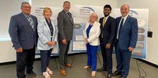 Community leaders and representatives of municipal and provincial governments gathered at the Miskin Law Community Complex on June 26, 2026 to mark the launch of the Homelessness and Addictions Recovery Treatment (HART) Hub in Peterborough. Pictured are Trent Lakes mayor Terry Lambshead, Haliburton-Kawartha Lakes-Brock MPP Laurie Scott, Peterborough-Kawartha MPP Dave Smith, Peterborough County warden Bonnie Clark, Scarborough-Rouge Park MPP and associate minister of mental health and addictions Vijay Thanigasalam, and Selwyn Township deputy mayor Ron Black, who is also board chair of the Four Counties Addictions Services Team (Fourcast), the lead organization for the HART Hub. (Photo courtesy of Ron Black)