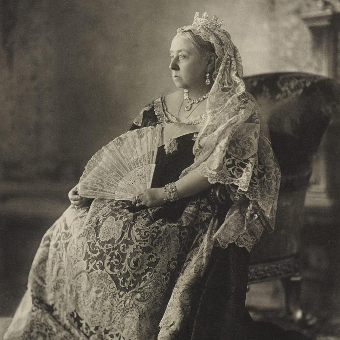 A photograph of Queen Victoria taken in July 1893 on the occasion of the wedding of her grandson Prince George (the future King George V) and Princess Mary of Teck (the future Queen Mary). The photograph later served as the official portrait for Queen Victoria's Diamond Jubilee in 1897. (Photo: W & D Downey / Royal Collection Trust)