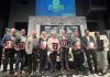 The nine Peterborough business leaders who were inducted into the 11th annual JA Business Hall of Fame at The Venue in downtown Peterborough on June 4, 2026. As the ceremony, Junior Achievement of Northern and Eastern Ontario (JA-NEO) also announced that the late late John McNutt, the longtime CEO and president of JA-NEO and executive director of the Council for Persons with Disabilities, along with his wife of 47 years, Sheryl Hopkins, would also be inducted into the JA Business Hall of Fame. (Photo courtesy of JA-NEO)
