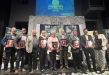 The nine Peterborough business leaders who were inducted into the 11th annual JA Business Hall of Fame at The Venue in downtown Peterborough on June 4, 2026. As the ceremony, Junior Achievement of Northern and Eastern Ontario (JA-NEO) also announced that the late late John McNutt, the longtime CEO and president of JA-NEO and executive director of the Council for Persons with Disabilities, along with his wife of 47 years, Sheryl Hopkins, would also be inducted into the JA Business Hall of Fame. (Photo courtesy of JA-NEO)