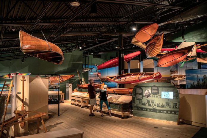 Attendees at the New Canadians Centre's "Lessons from the Land" event on July 1, 2026 at the Jiimaan Kinomaagewin / Canadian Canoe Museum can receive a stamp for free admission to the museum, where they can browse the exhibits in the Exhibition Hall. (Photo: Justen Soule)
