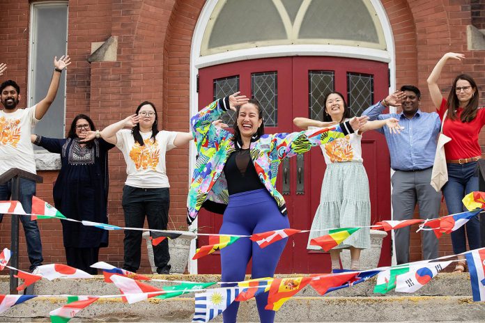 Dianely Hernandez of Dianely Fitness Dance leads New Canadians Centre representatives in Zumba during an announcement on June 10, 2026 of the non-profit organization's fifth annual Canadian Multicultural Festival, which runs from Wednesday, June 17 to Friday, June 26. A popular dance-fitness program that combines high-energy aerobic exercise with Latin and world rhythms, Zumba will be offered on June 18 in Peterborough and Bobcaygeon and on June 25 in Port Hope. (Photo: Jordan Lyall / kawarthaNOW)