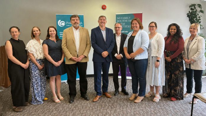 Pictured during the May 29, 2026 announcement of $2.1 million in Ontario government funding to connect unattached patients to primary care are, from left to right, Dr. Britt Lehmann-Bender, Dr. Wendy Thomas, Peterborough Family Health Team clinical manager Kathryn Ward, Peterborough Family Health Team CEO Duff Sprague, Peterborough-Kawartha MPP Dave Smith, Peterborough city councillor Dave Haacke, Peterborough 360 Degree Nurse Practitioner-Led Clinic executive director Danielle Howson, Peterborough Community Health Centre executive director Ashley Safar, Dr. Madura Sundareswaran of the Peterborough Newcomer Health Clinic, and Peterboorugh County deputy warden and Selwyn Township mayor Sherry Senis. (Photo courtesy of Peterborough Family Health Team)