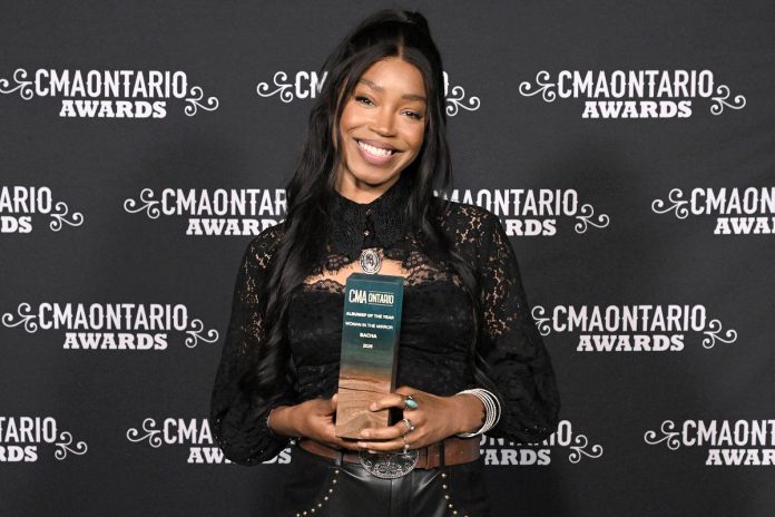 Warkworth singer-songwriter Sacha with her Album/EP of the Year award at the Country Music Association of Ontario's 14th annual CMAOAwards on May 31, 2026 in Port Credit. She also took home the Female Artist of the Year award. (Photo: Grant Martin)