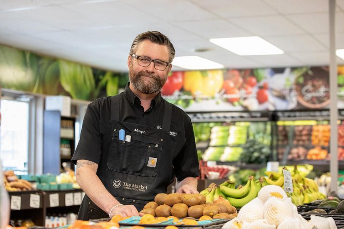 In fall 2024 after a 25-year career in media, Darren Murphy purchased The Market, a gourmet food shop in Lakefield. Since stepping into the new role, the Young's Point resident has maintained the quality and variety of products that can be found at the store, while transitioning to work with more Canadian suppliers and producers, crafting more prepared meals, and growing a social media presence by becoming "Murph at The Market." (Photo: Jordan Lyall Photography) In fall 2024 after a 25-year career in media, Darren Murphy purchased The Market, a gourmet food shop in Lakefield. Since stepping into the new role, the Young's Point resident has maintained the quality and variety of products that can be found at the store, while transitioning to work with more Canadian suppliers and producers, crafting more prepared meals, and growing a social media presence by becoming "Murph at The Market." (Photo: Jordan Lyall Photography)