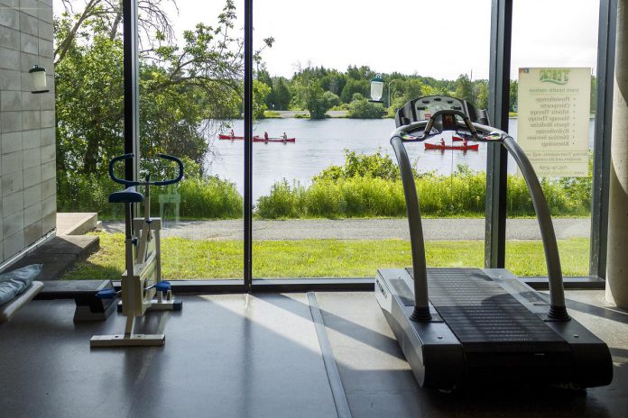 Trent Health in Motion's facilities at the Trent University Athletic Centre overlook the Otonabee River and contains a full weight room and cardio loft, therapy pool, fitness studios, and more. The integrated health clinic is open to the public. (Photo courtesy of Trent Health in Motion)