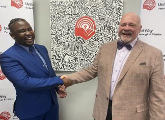 United Way Peterborough and District welcomes Jason Seguya as its 10th CEO The United Way Peterborough and District's incoming CEO Jason Seguya shakes hands with retiring CEO Jim Russell during an announcement at the United Way's office on June 18, 2026. The 27-year-old will begin in his new role on July 6, with Russell staying until July 17 to help with the transition. (Photo: Paul Rellinger / kawarthaNOW)