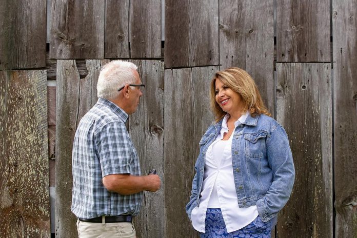 kawarthaNOW's Paul Rellinger speaks with 4th Line Theatre managing artistic director Kim Blackwell during a media day event for "Wild Irish Geese" at the Winslow Farm in Millbrook July 22, 2026. As she did for Megan Murphy's play about the Peter Robinson emigration during its sold-out world premiere last summer, Blackwell will be directing the play for its restaging from August 4 to 29. (Photo: Jordan Lyall / kawarthaNOW)