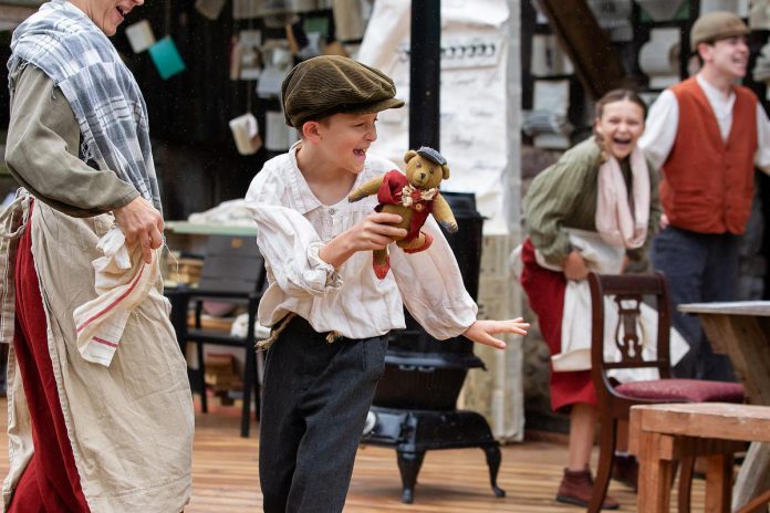 Young actor Jasper Chesser performs in a scene from "Wild Irish Geese" with (left to right) Lindsay Wilson, Indigo Chesser, and Darragh O'Connell during a media day event at 4th Line Theatre in Millbrook on July 22, 2026. Megan Murphy's play about the Peter Robinson emigration returns to the Winslow Farm from August 4 to 29 after its sold-out world premiere last summer. (Photo: Jordan Lyall / kawarthaNOW)