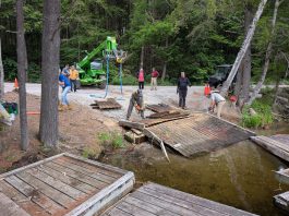 From June 26 to 28, 2026, a group of volunteers from a wide range of organizations came together at the Little Gull Lake Marina on Mississagua Lake and the Gold Lake boat launch to remove more than 60 abandoned docks and other waste volunteers collected from the Catchacoma-Mississagua lakes system as part of the Abandoned Dock Initiative led by the Cavendish Community Ratepayers Association Inc. To continue the cleanup and remove a total of more than 100 abandoned docks, organizers have launched a GoFundMe with the goal of raising $20,000. (Photo courtesy of Abandoned Dock Initiative)