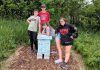 Youth-run small business Empire Beez installs beehive at community garden in Campbellford The youth team behind Empire Beez in Trent Hills (left to right: Sebastian Smith, Owen Musson, Eloise Smith, and Penelope McEvoy) stand with the beehive they installed at the Simpson Street Community Garden in Campbellford. The group launched the small business last year with the aim of raising awareness around honeybees and installing community beehives. The team will be unveiling the beehive during a garden talk held by IncrEdible Trent Hills on July 9, 2026. (Photo courtesy of Blythe Weber)