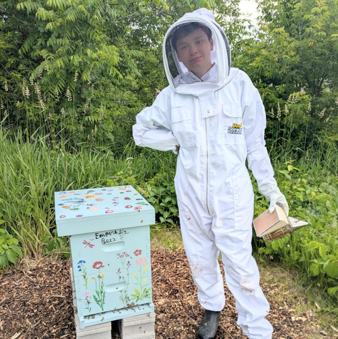 A resident of the Municipality of Trent Hills, 13-year-old Sebastian Smith is the founder of Empire Beez. Always harbouring an interest in bees, he learned about them by joining the junior beekeeper program led by Dancing Bees Equipment in Port Hope. Upon learning about colony collapse disorder, he launched the business to raise awareness about declining bee populations and to raise funds to install community beehives. (Photo courtesy of Blythe Weber)